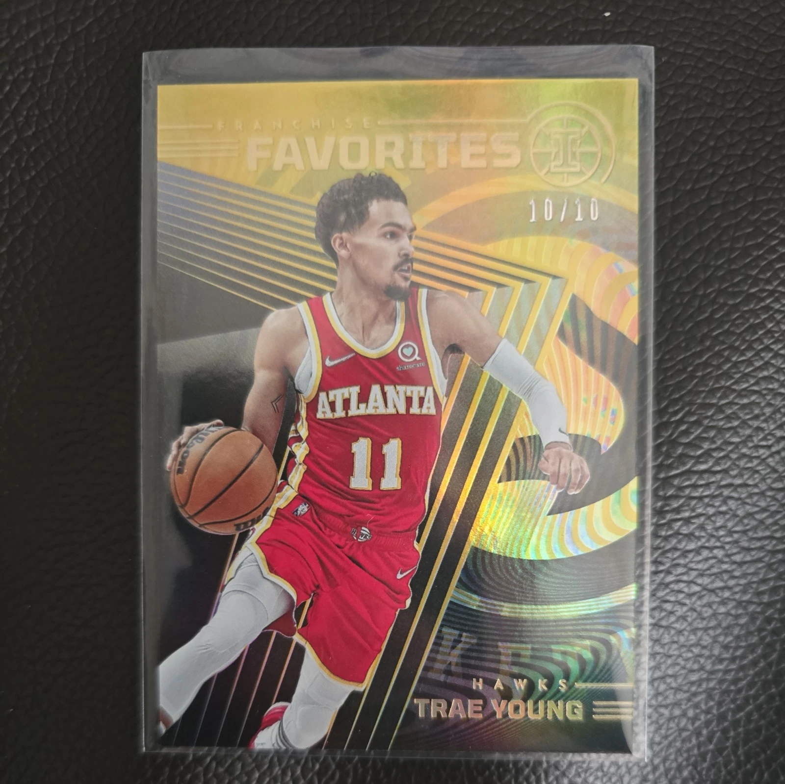 2021-22 Panini Illusions Trae Young #7 Franchise Favorites Gold /10