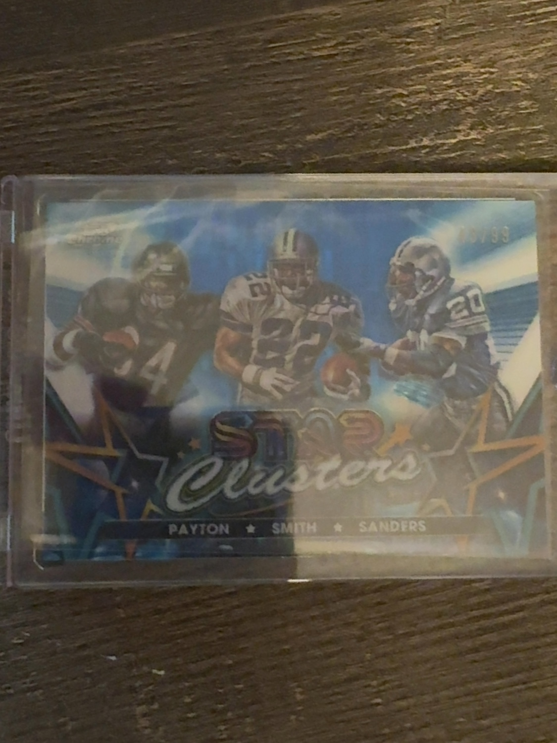 2024 Topps Cosmic Chrome Walter Payton / Emmitt Smith / Barry Sanders #SCL-5 Star Cluster Blue /99