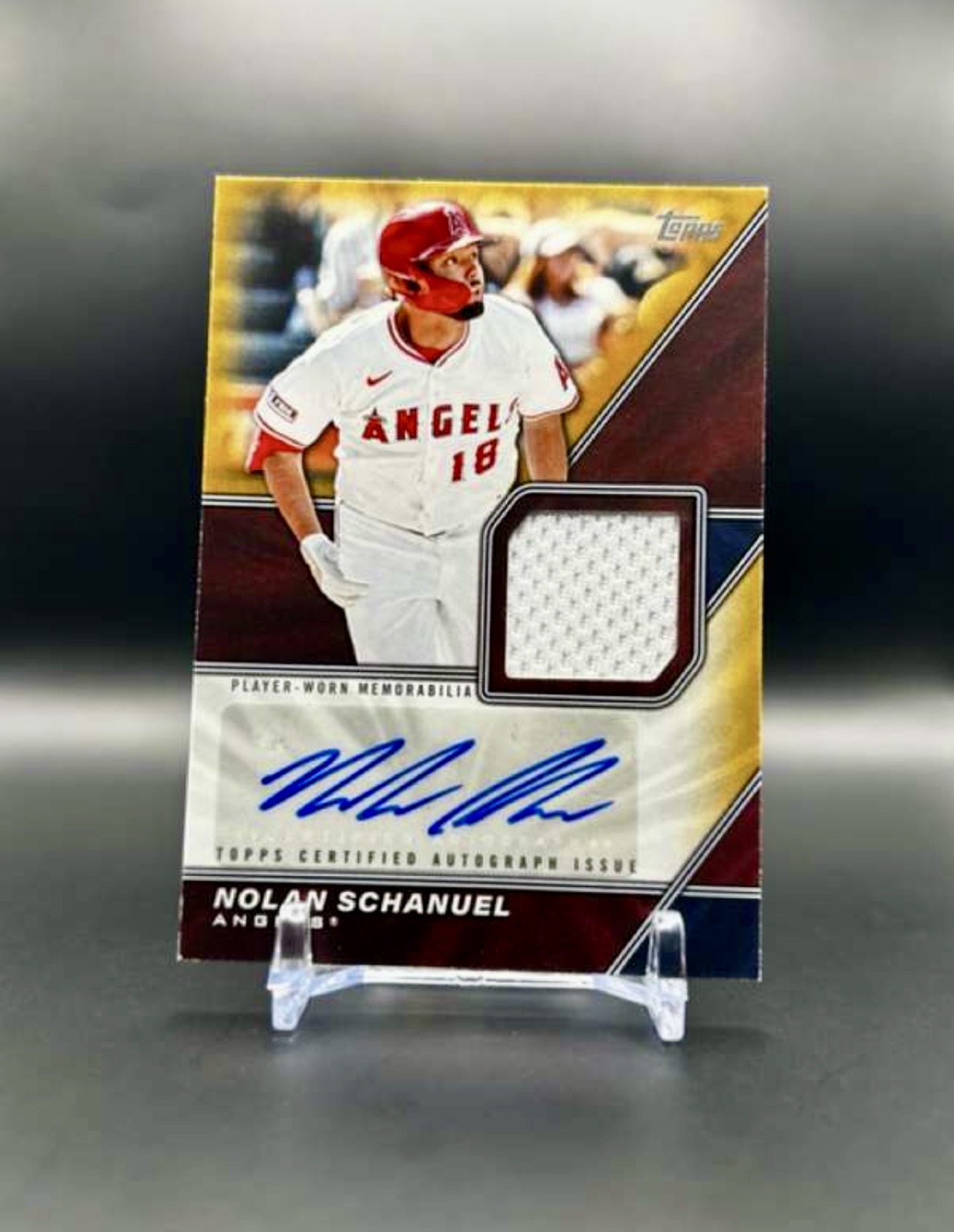 2026 Topps Nolan Schanuel #MLMA-NS Major League Materials Autographs Gold #’d 39/50 