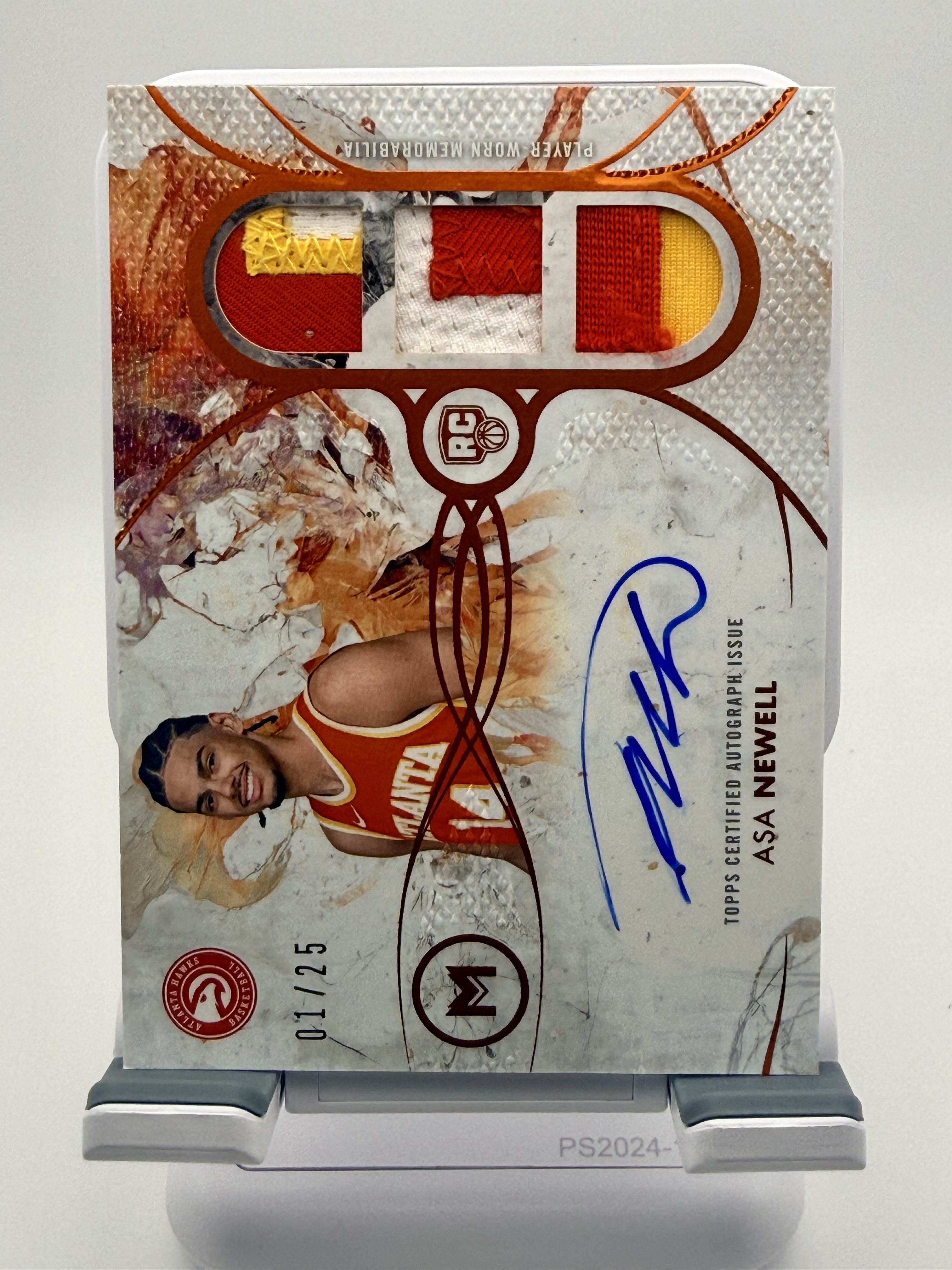 2025-26 Topps Motif - Motif Rookie Triple Relic Autographs Asa Newell #RTRA-AN Cadmium Orange