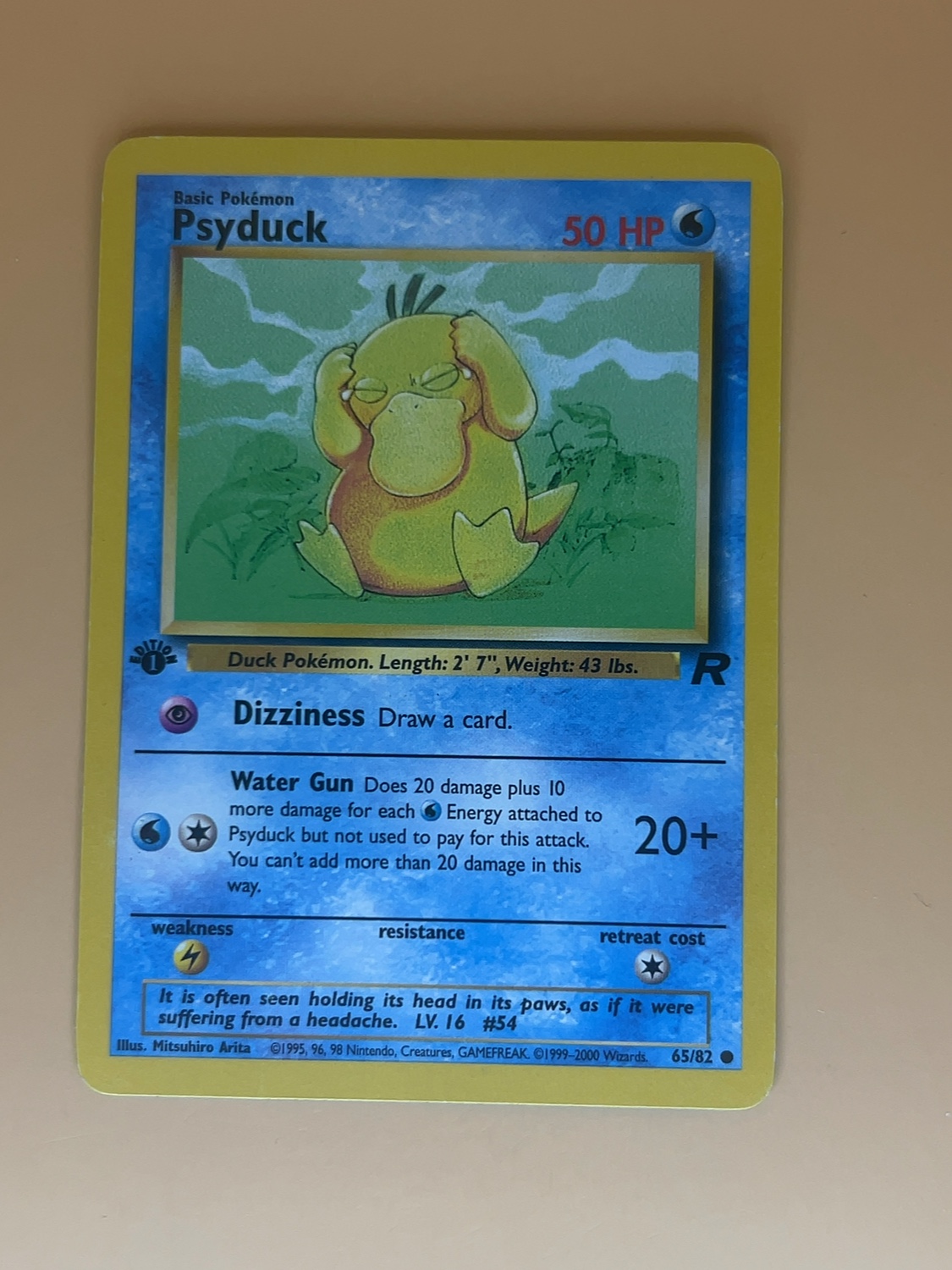 Team Rocket Psyduck #65/82 1st Edition